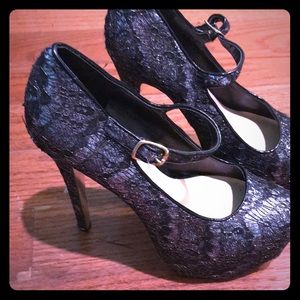 Sparkling silver platforms with black lace overlay